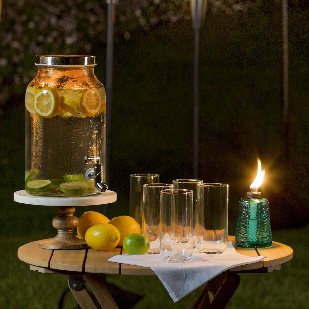 Enhance Outdoor Ambiance with TIKI Brand 1116040 Molded Glass Table Torches in Red, Green, and Blue - Perfect for Patios and Gardens